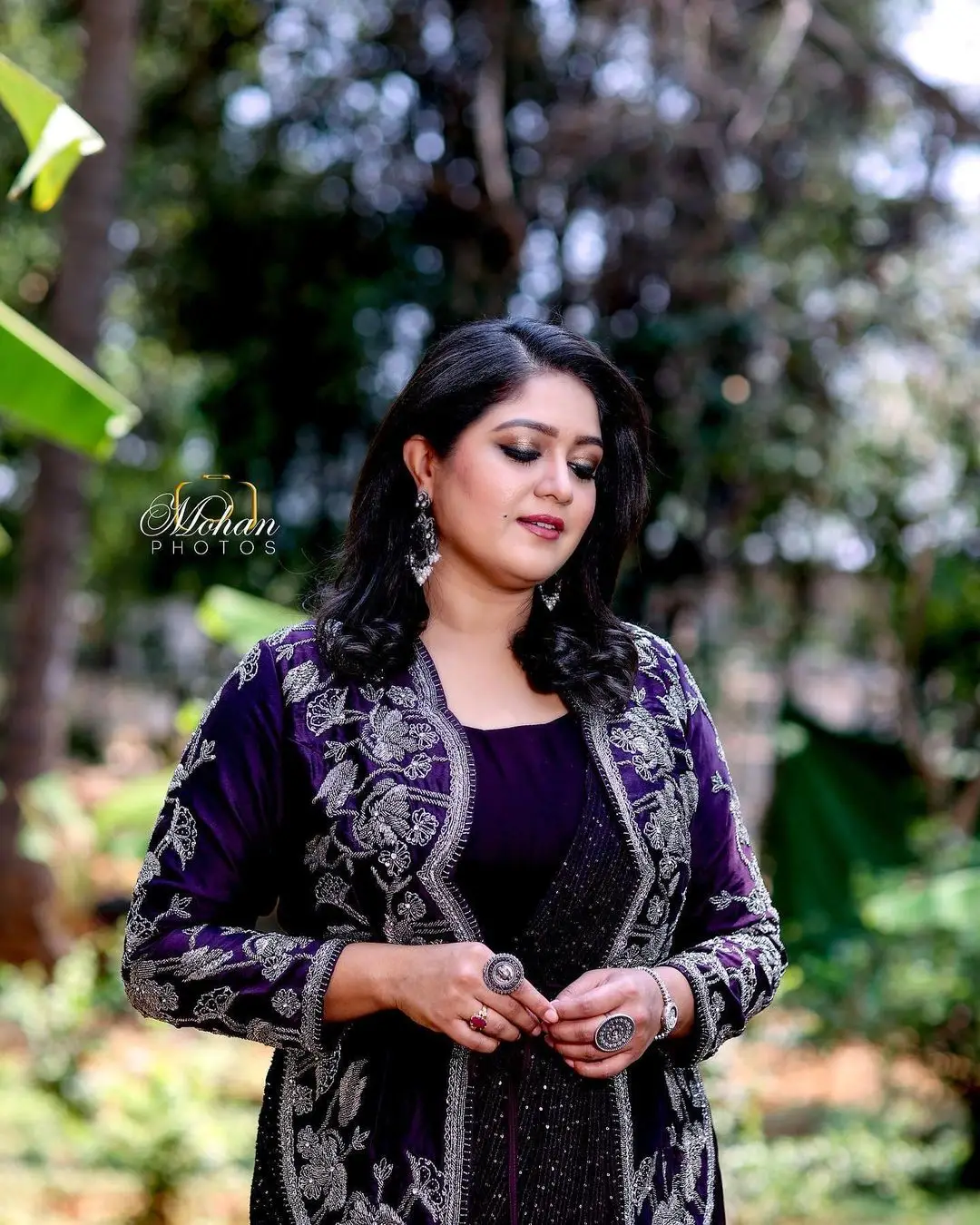 Meghana Raj Wearing Beautiful Earring Black Designer Gown